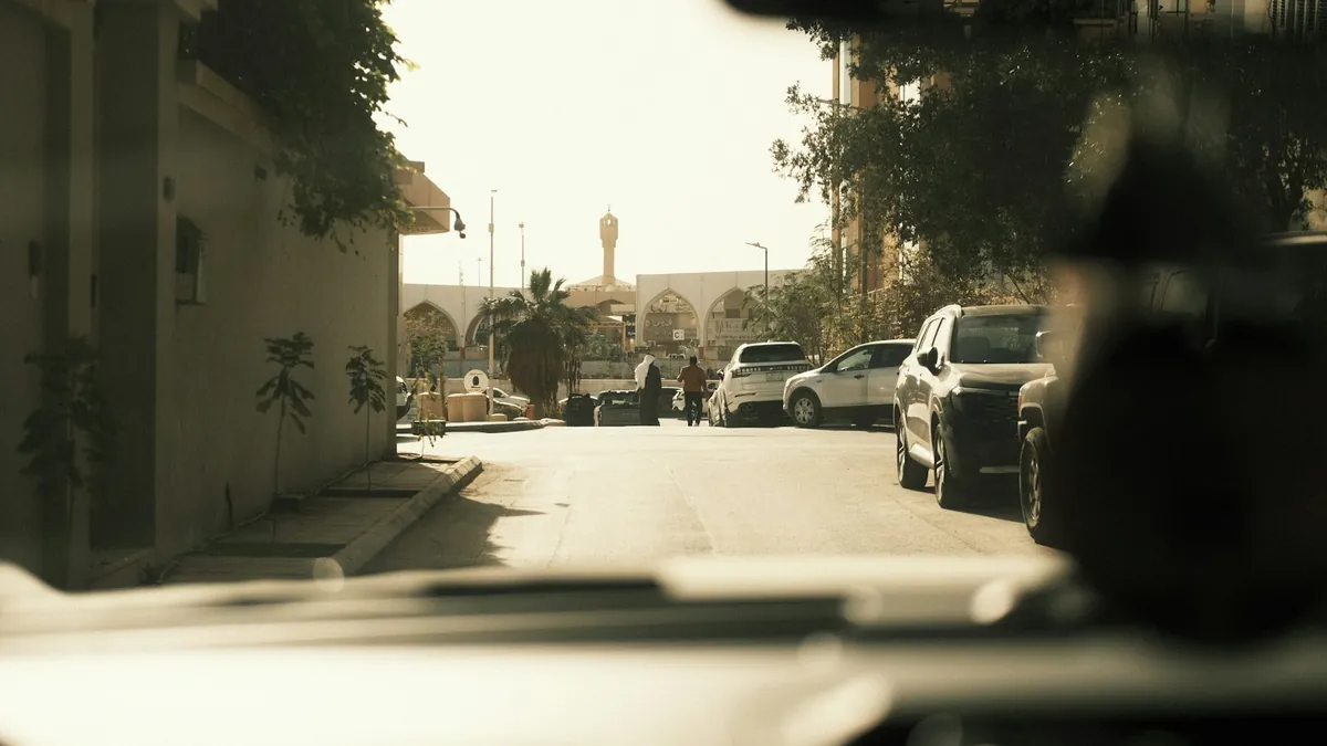 View from a car along a sunny street in Riyadh